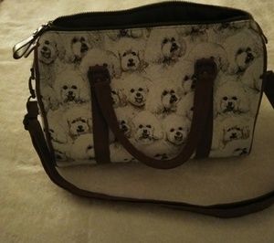 A Satchel purse with Bishon print.